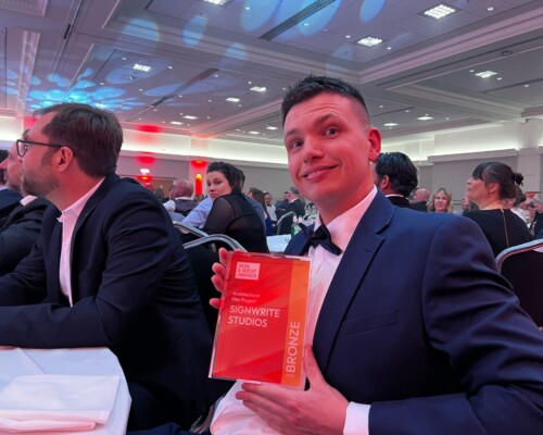 Tyron proudly holding our Bronze Award for the Architectural Film category at the Sign & Wrap Awards 2025 Tyron holding the Bronze Award for Architectural Film at the Sign & Wrap Awards 2025