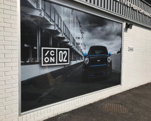 Digitally printed one-way ContraVision film printed & installed for Mulgari